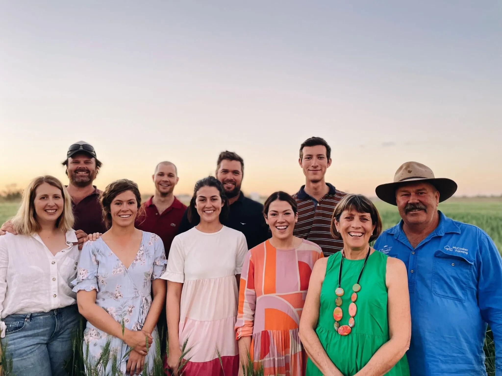 The McCosker family together outdoors on the property